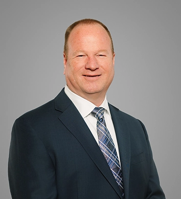 Headshot of SHAZAM Executive Vice President and Chief Business Officer Jace Day